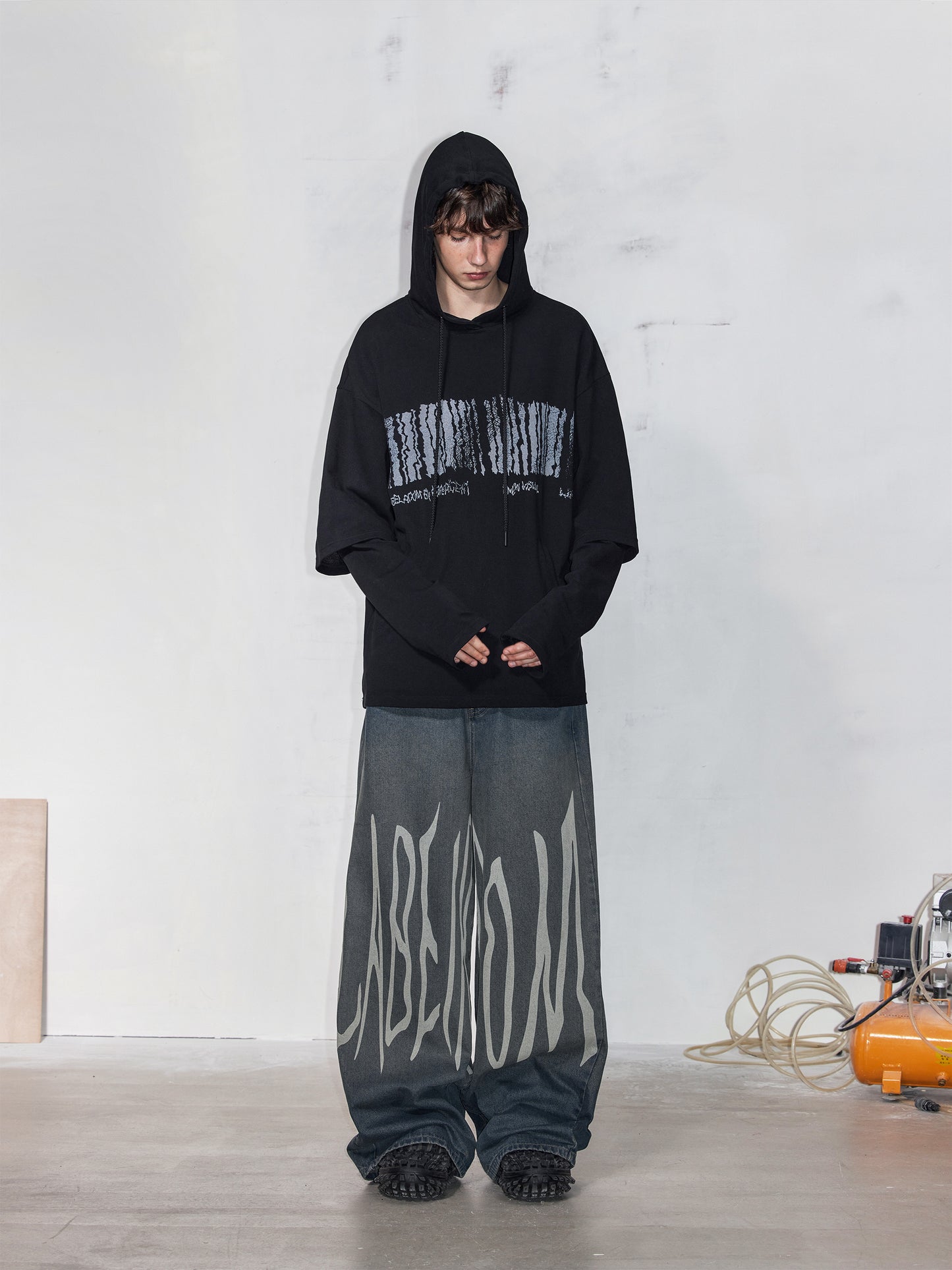 Faux two-piece hooded printed sweatshirt