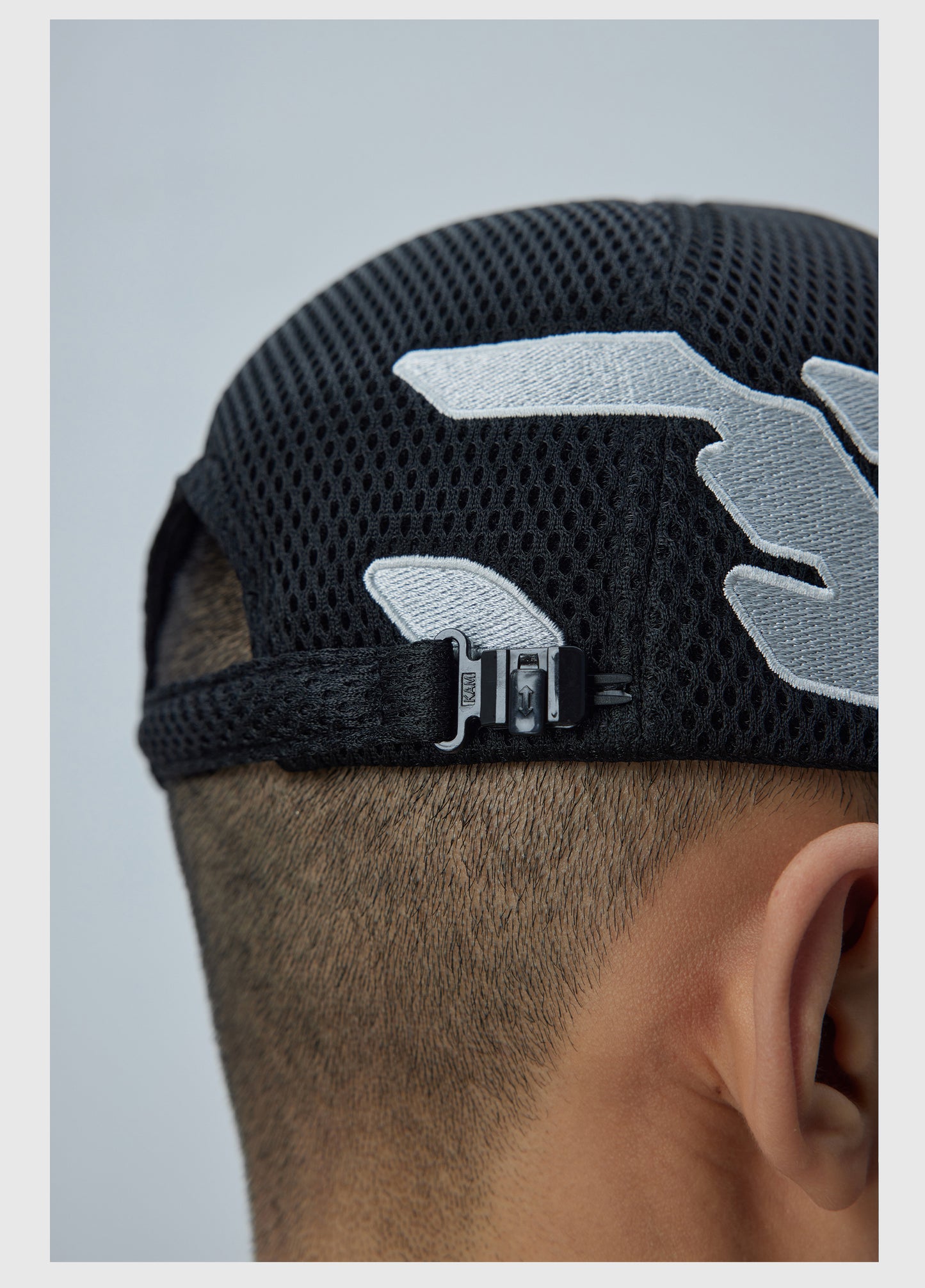 Adjustable mesh embroidered cap