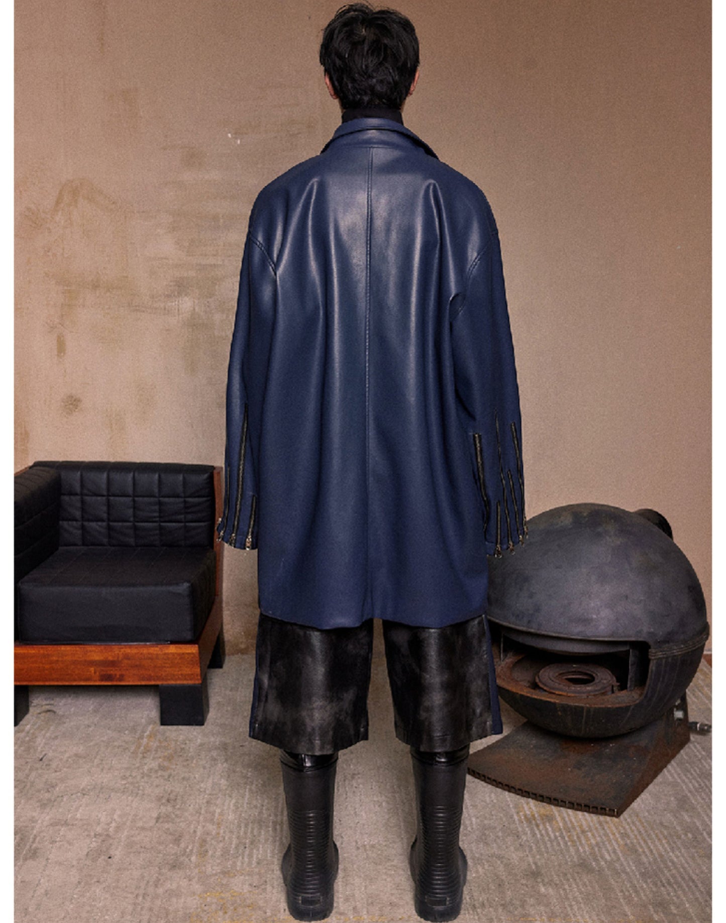 Punk style mid-length leather jacket