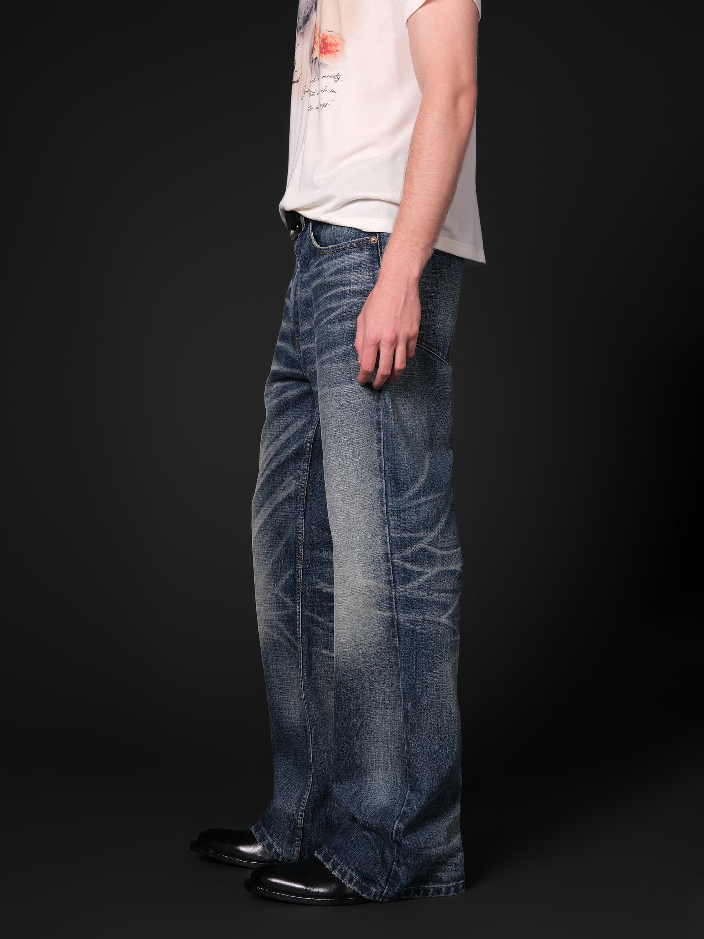 Washed distressed flared jeans
