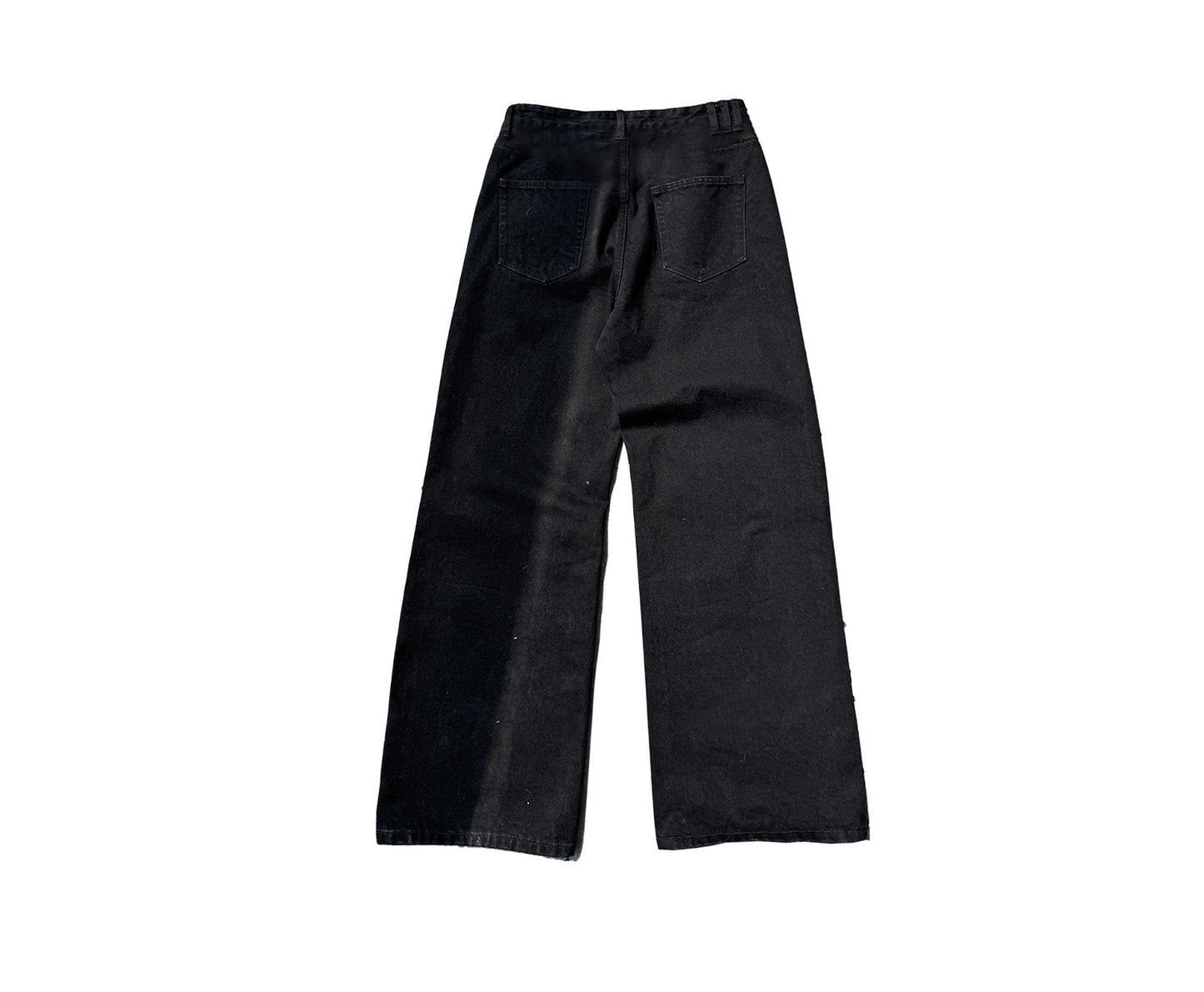 Jeans with distressed knee patches