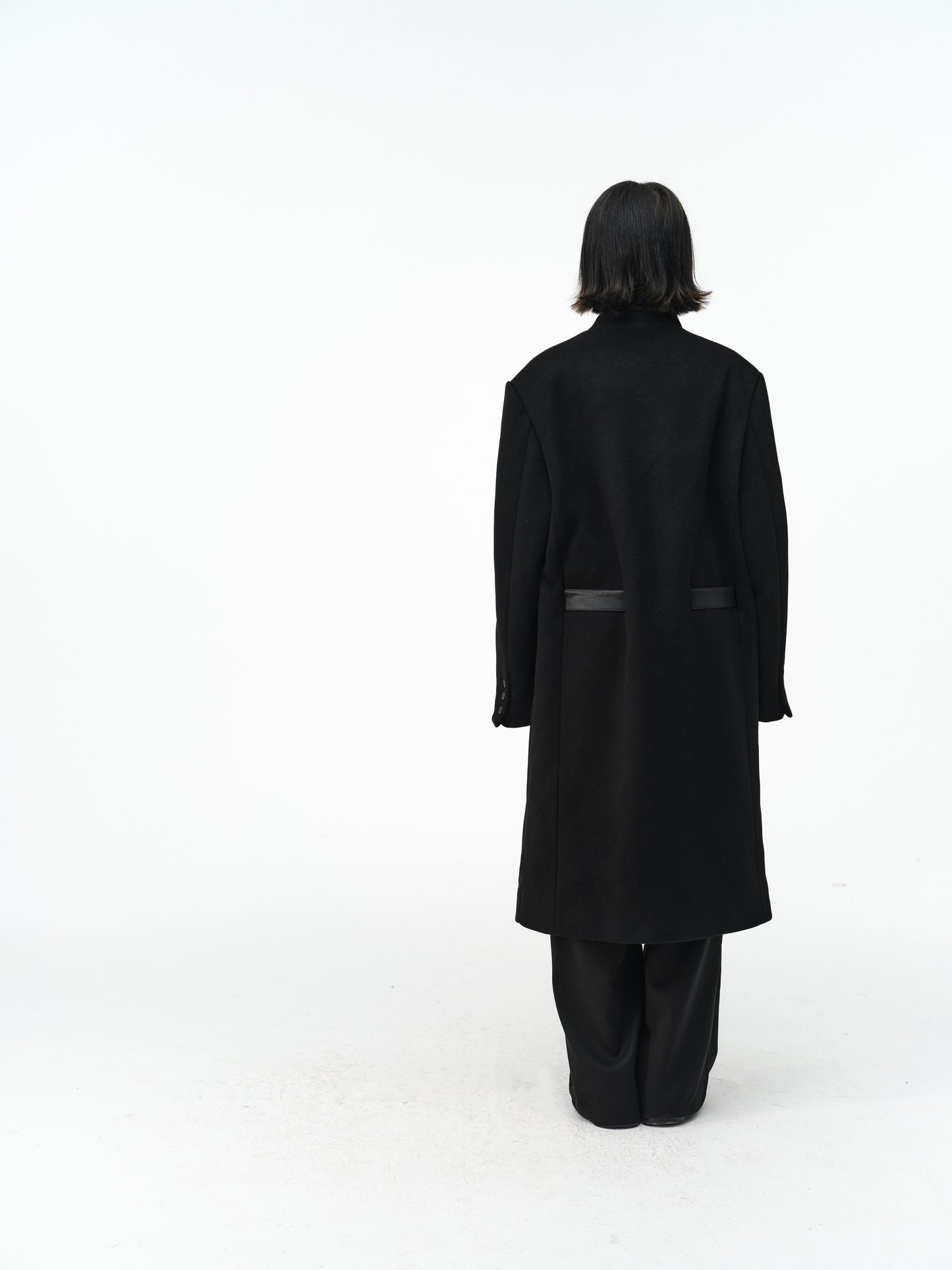 Overcoat with a leather belt