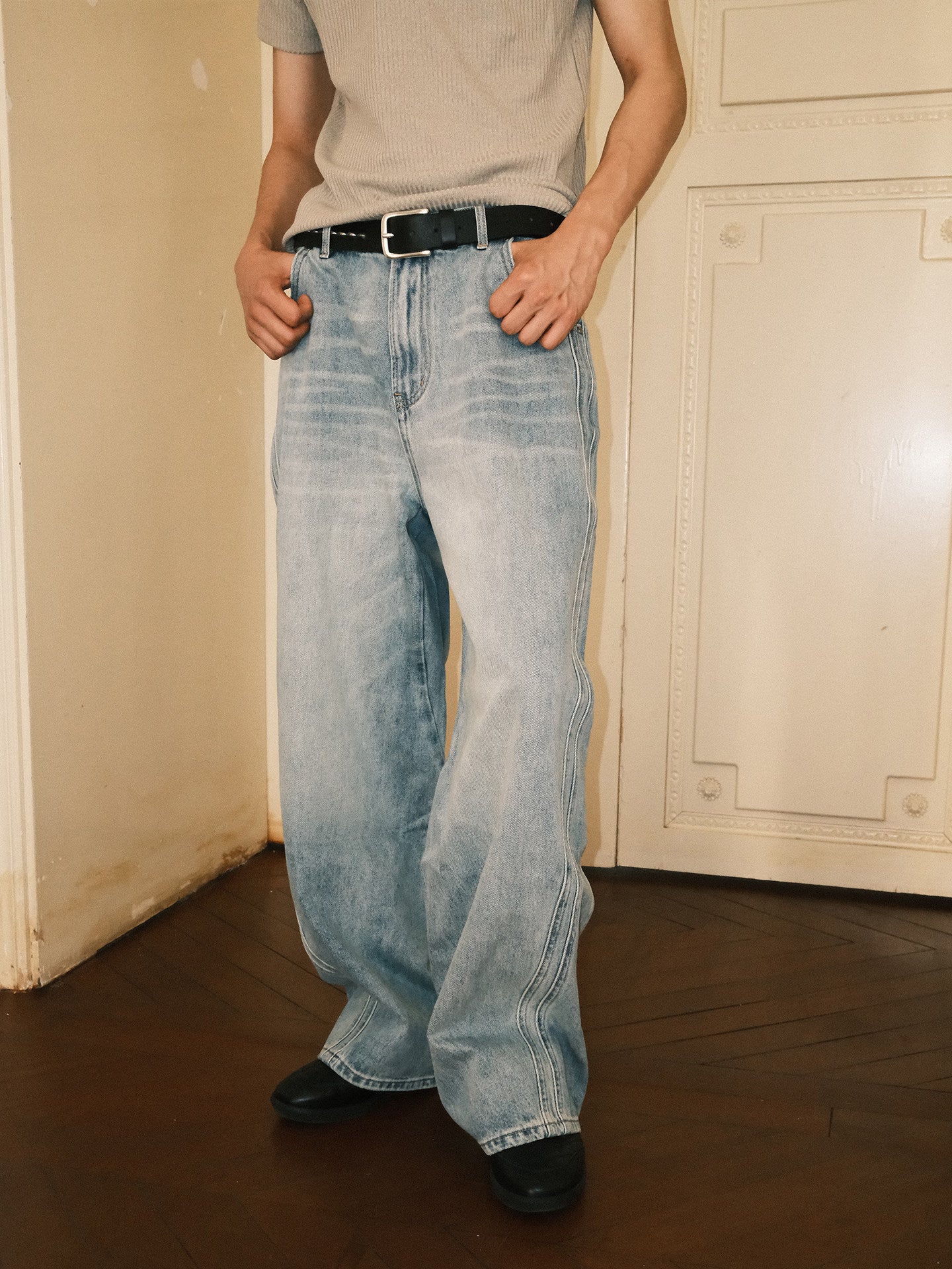 Wash-processed deconstructed denim pants