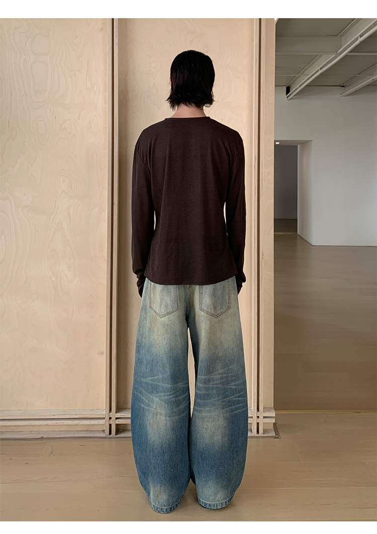 Mud-dyed wide-leg jeans