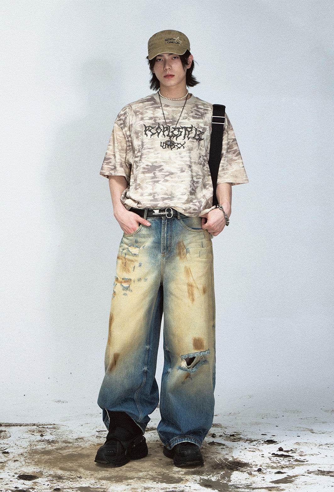 Mud-dyed wide-leg straight jeans