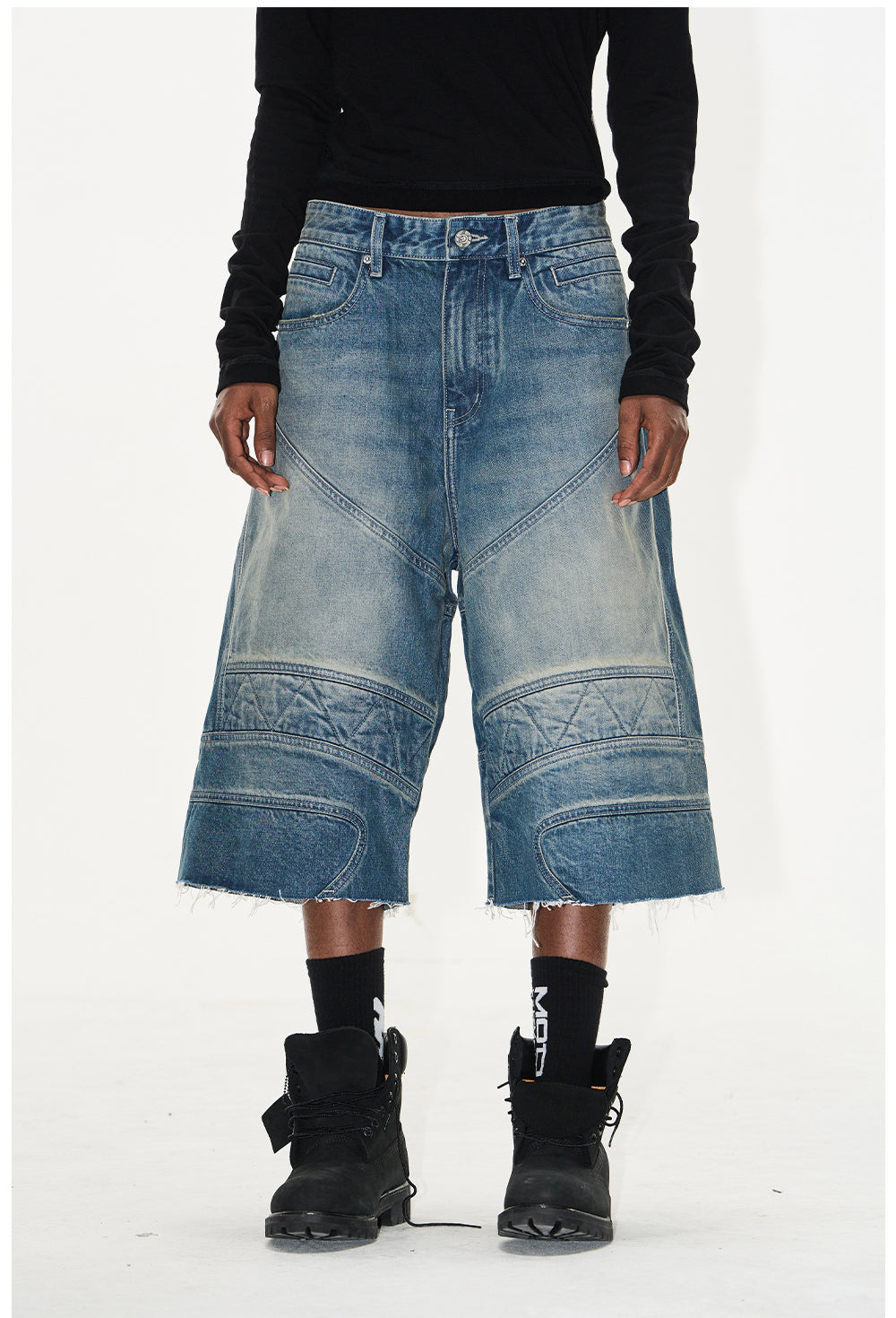 Wash-processed distressed denim shorts