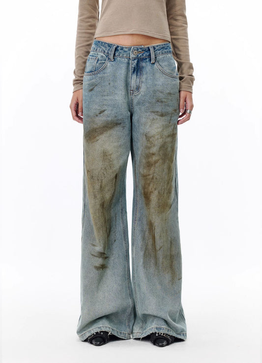 Mud-dyed dirty fit jeans