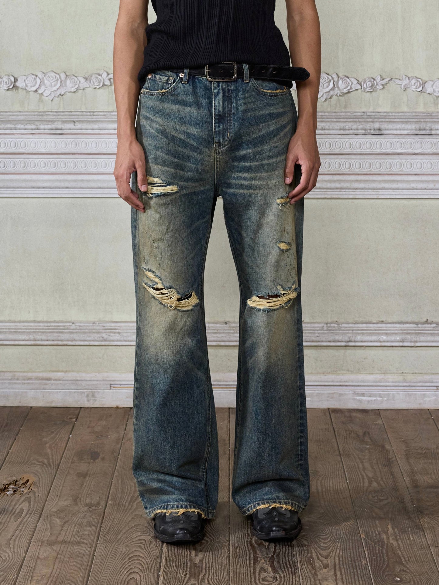 Distressed wash bootcut jeans