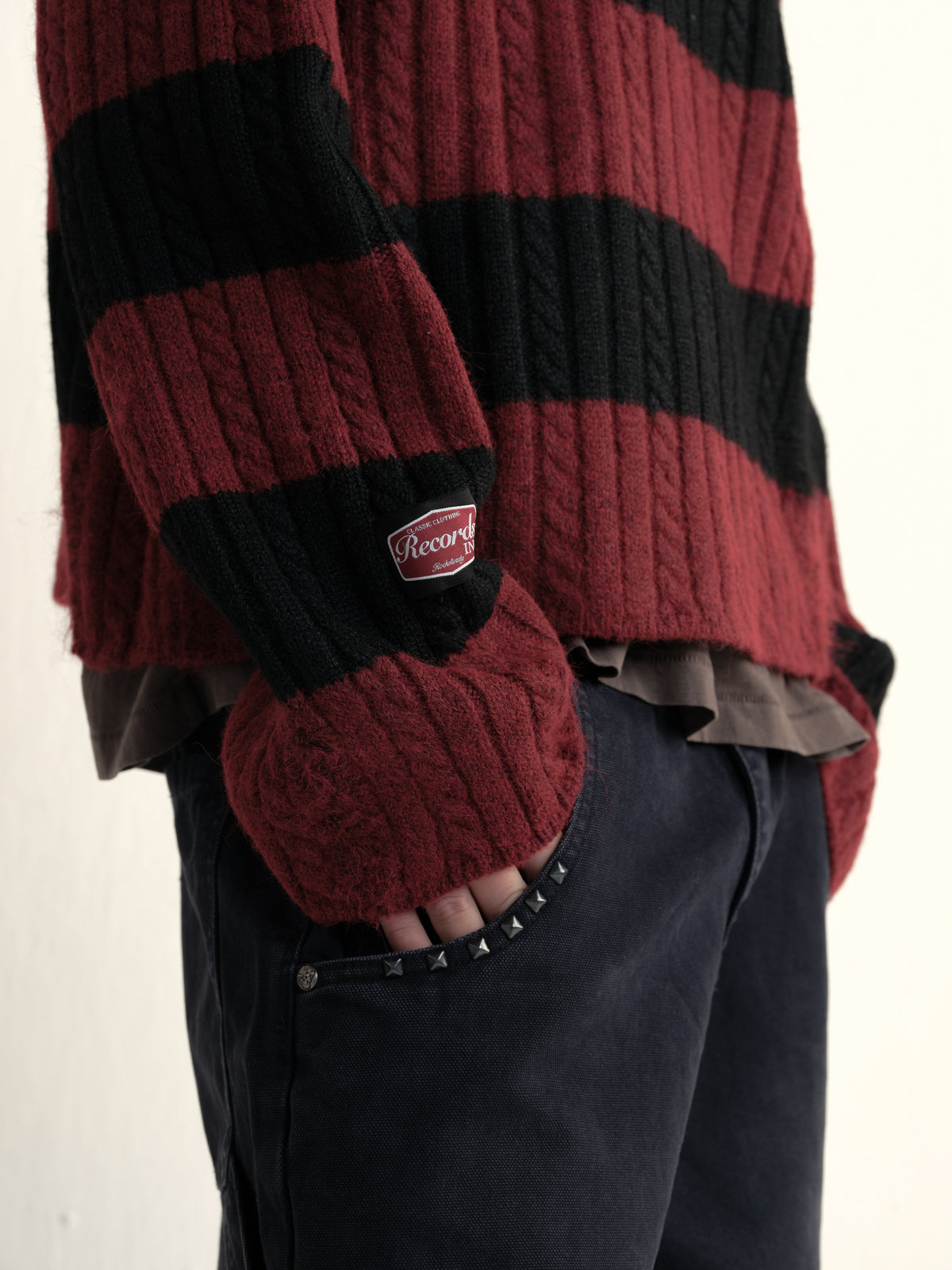 Cable wool striped distressed sweater