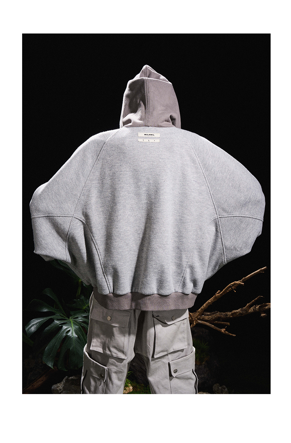 Sweatshirt with hood made of different material