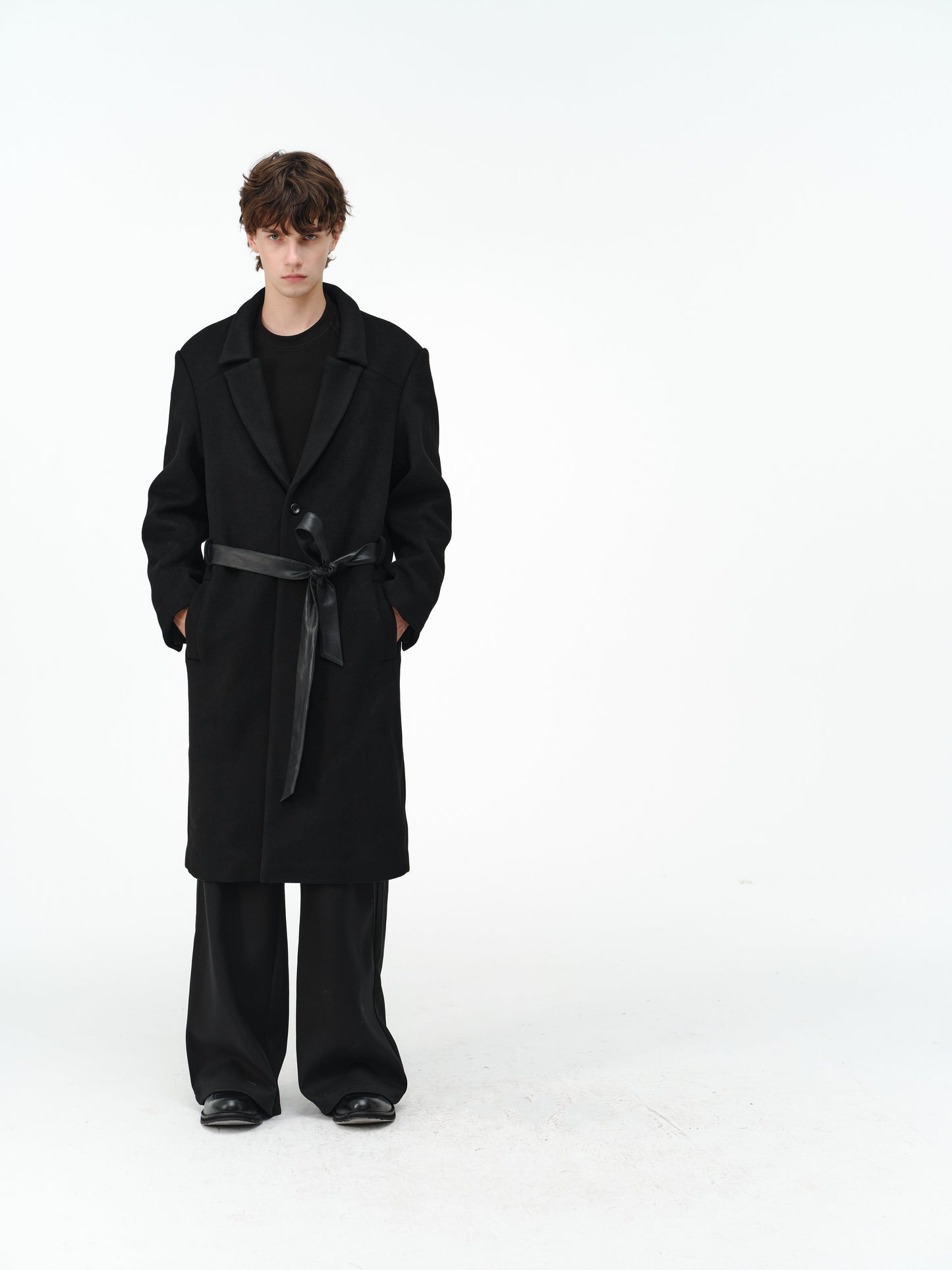 Overcoat with a leather belt