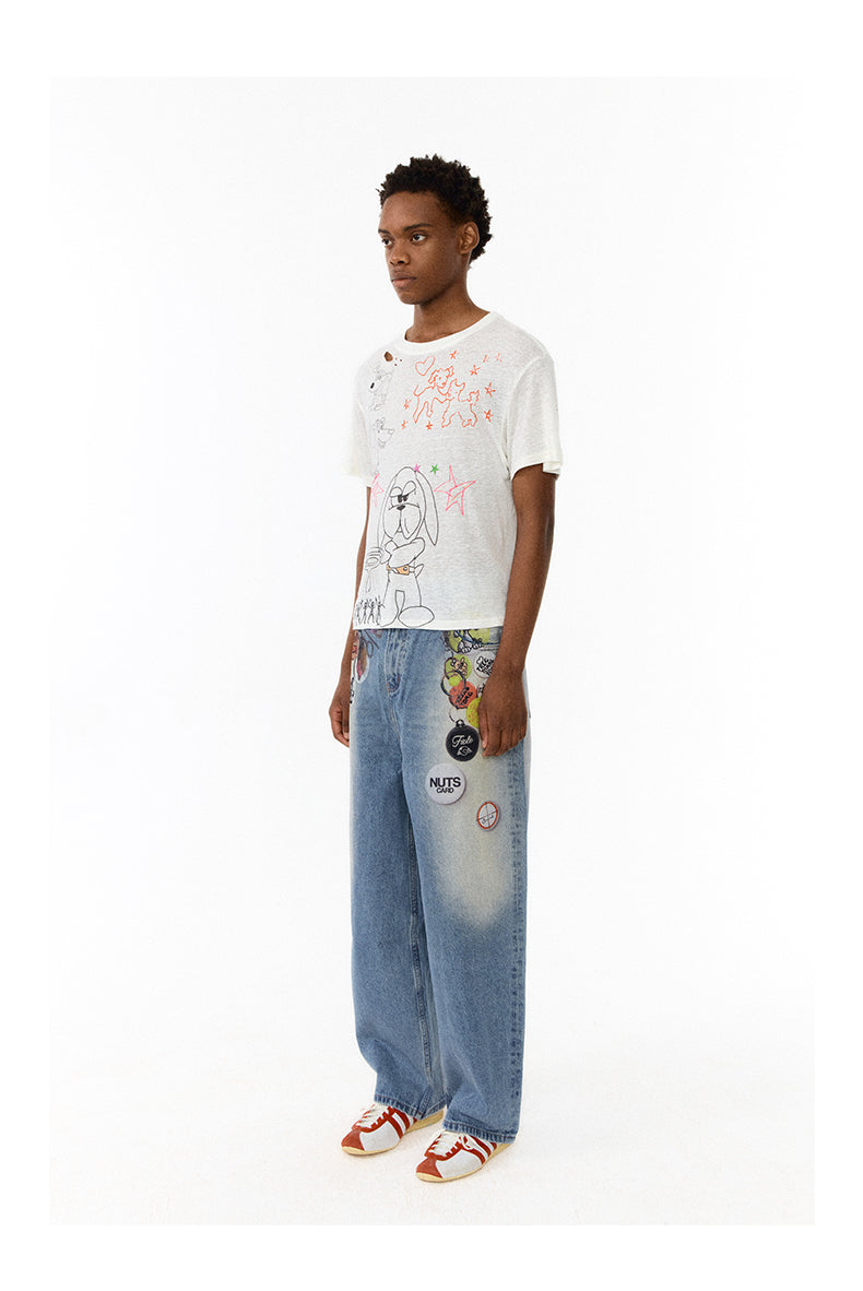 Medal print denim pants