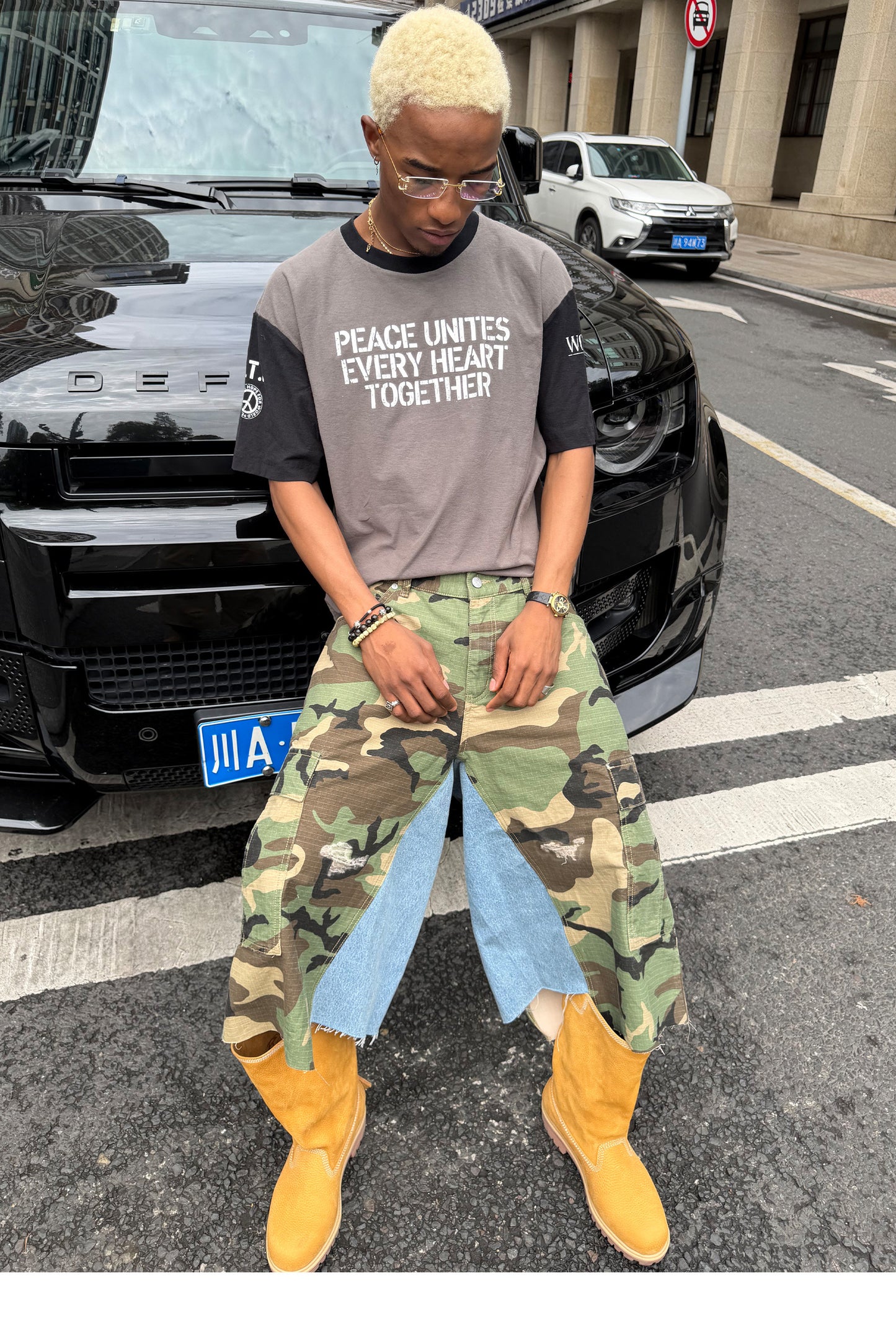 Camouflage-Print Distressed Patchwork Shorts