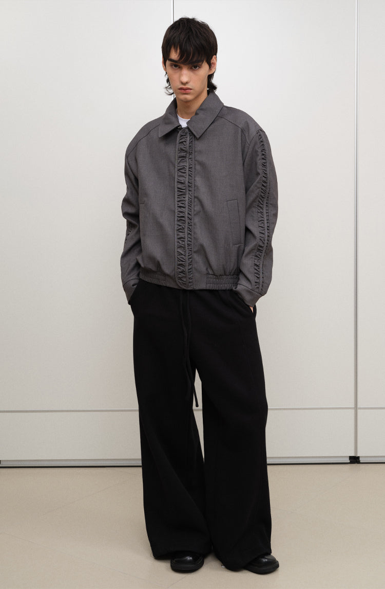 Pleated jacket with front placket