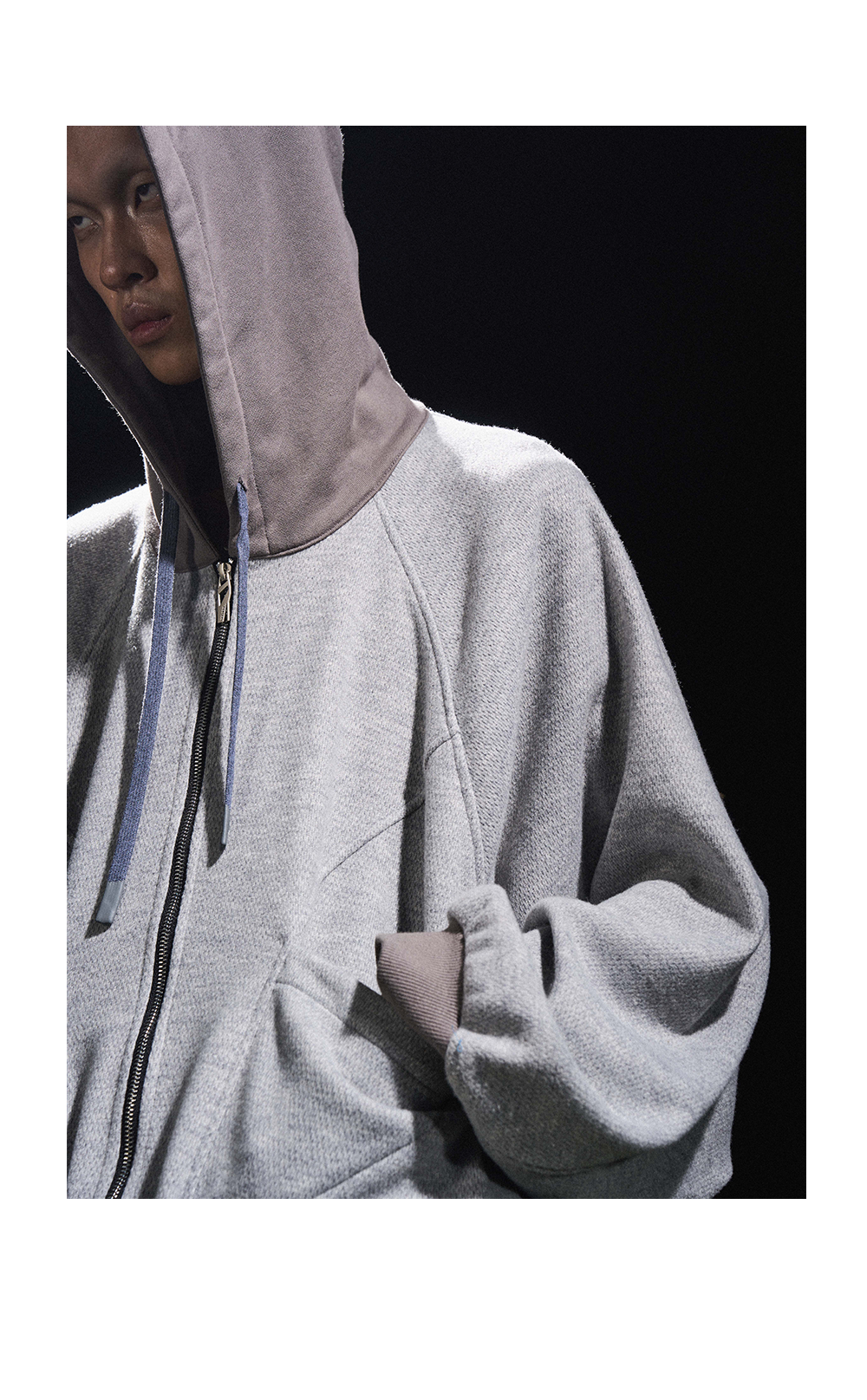 Sweatshirt with hood made of different material