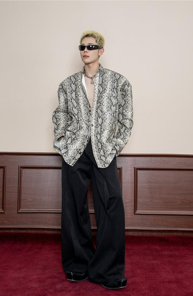 Snakeskin patterned shirt with shoulder pads