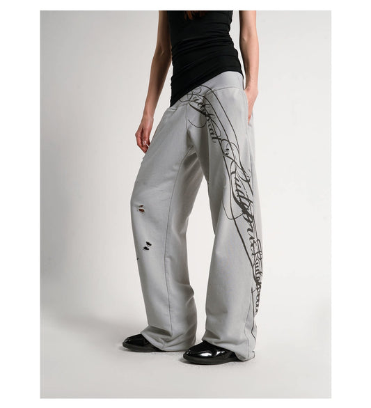 Wash-treated sweatpants featuring a scimitar pattern
