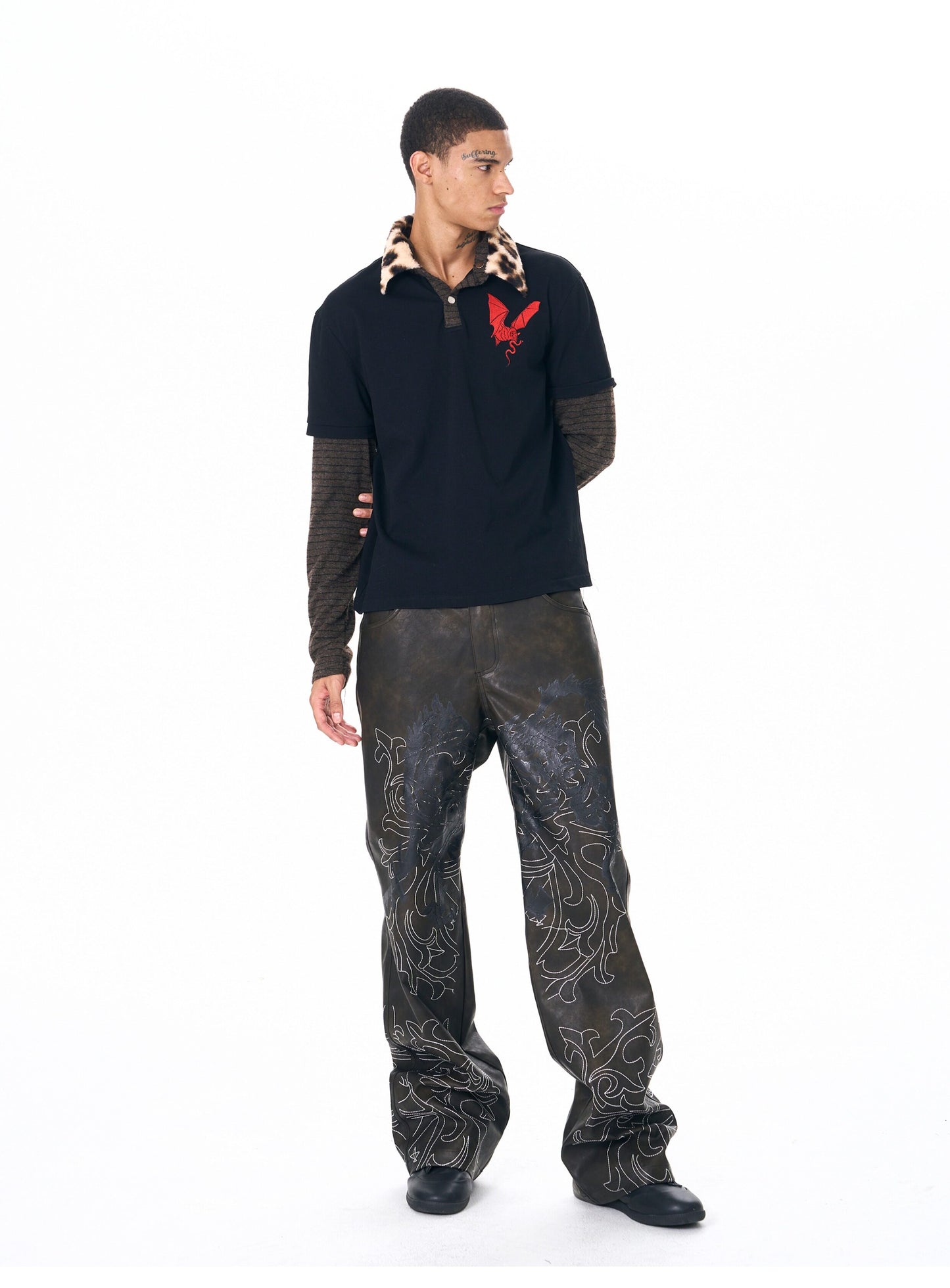 Hand-embroidered leather pants