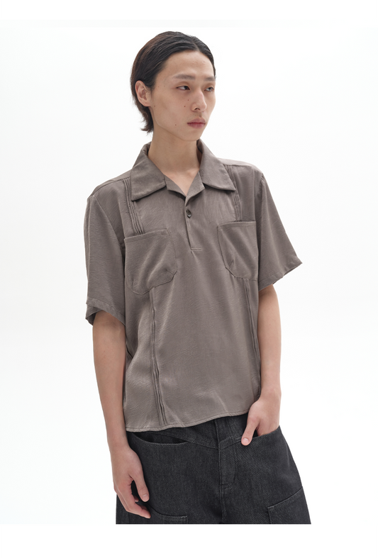 Pleated design polo shirt