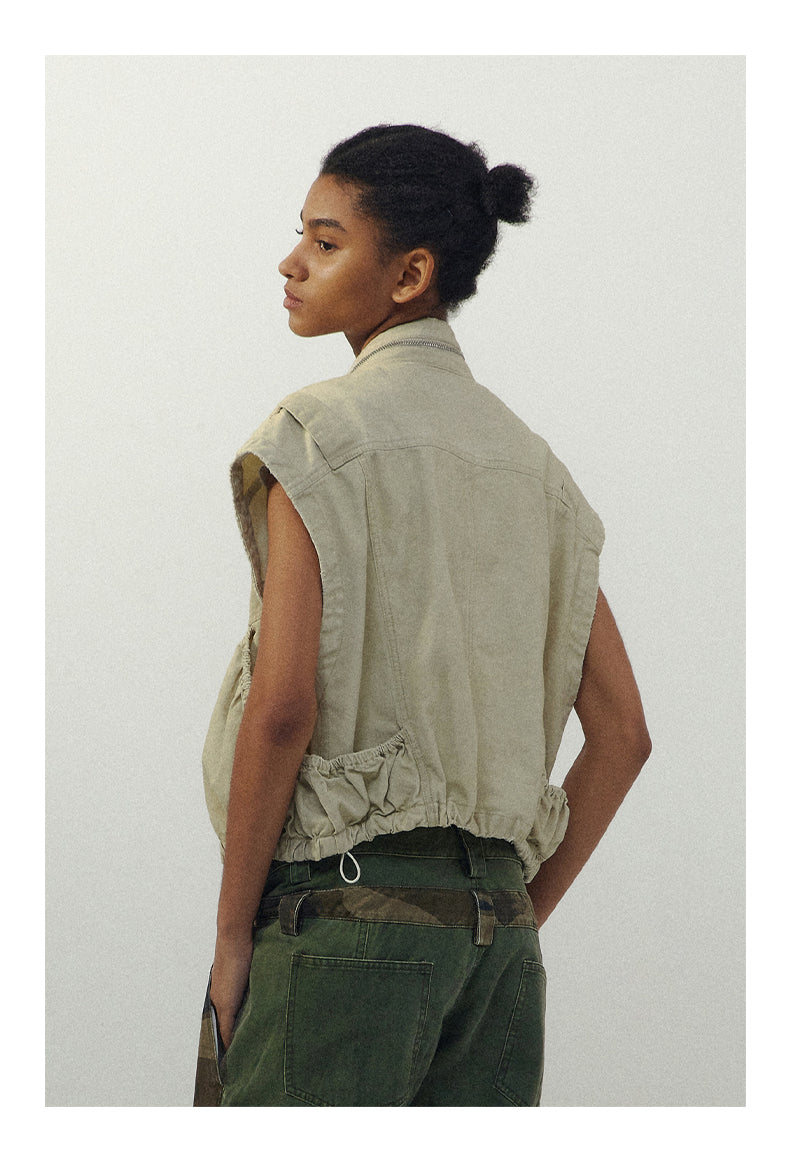 Damaged pleated work vest