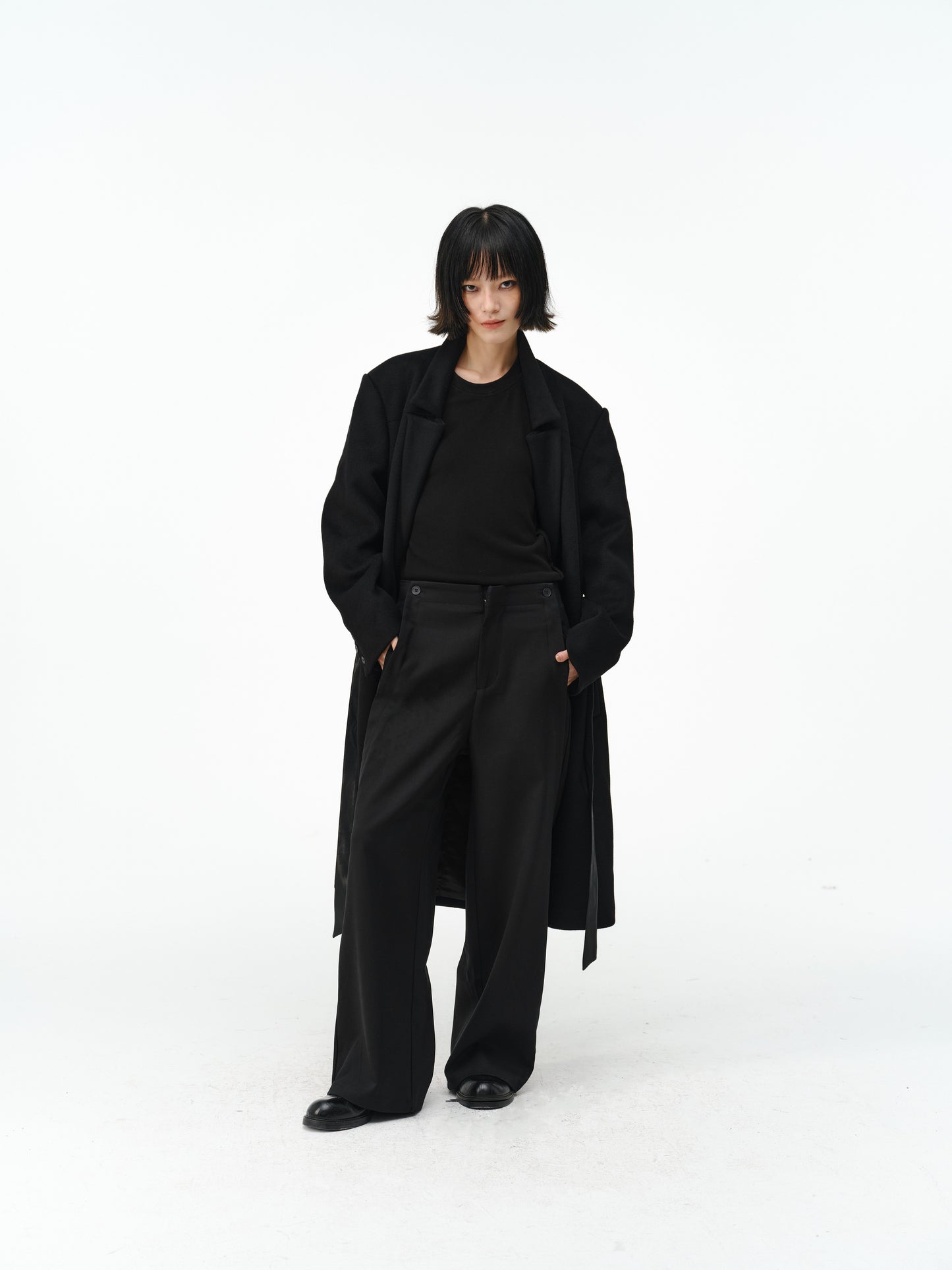 Overcoat with a leather belt
