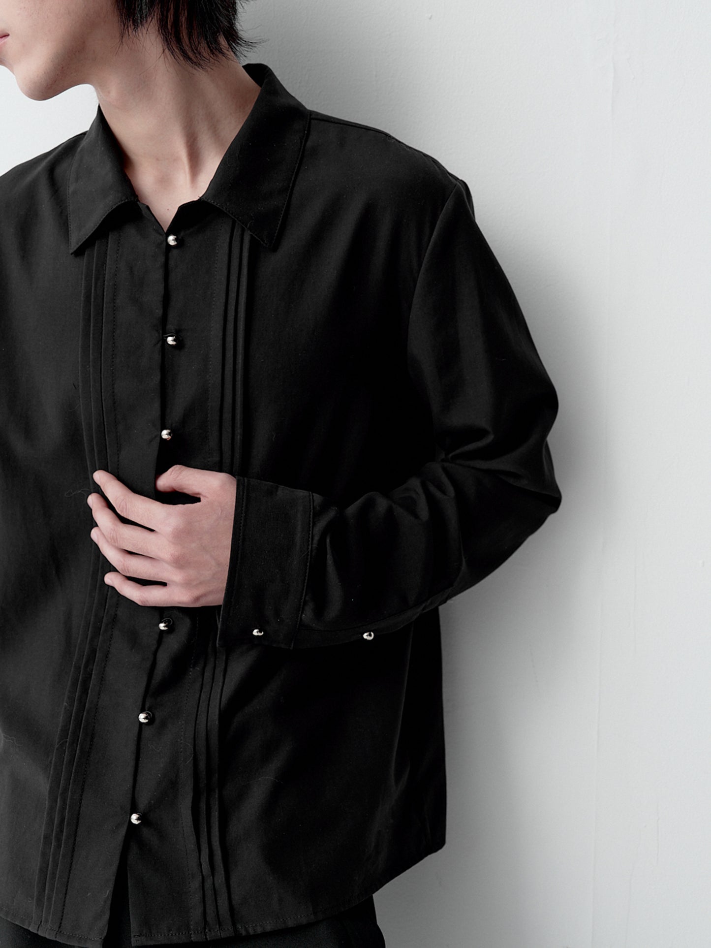 Shirt with metal buttons