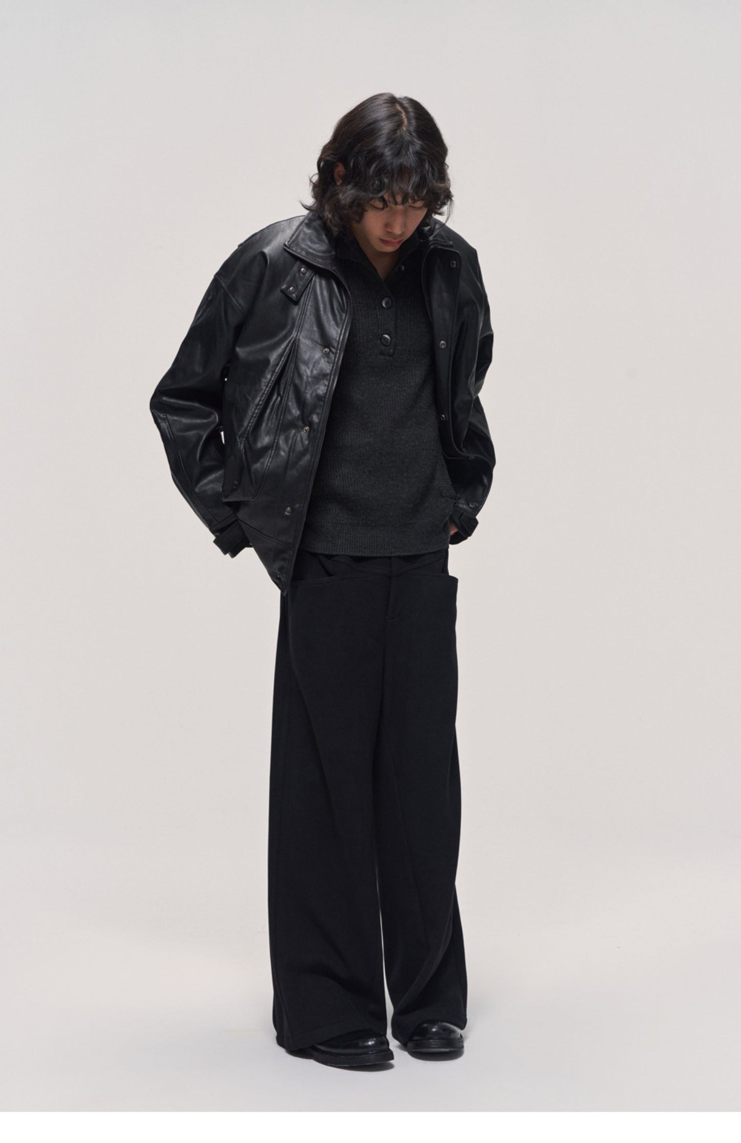 Damaged mid-length leather jacket