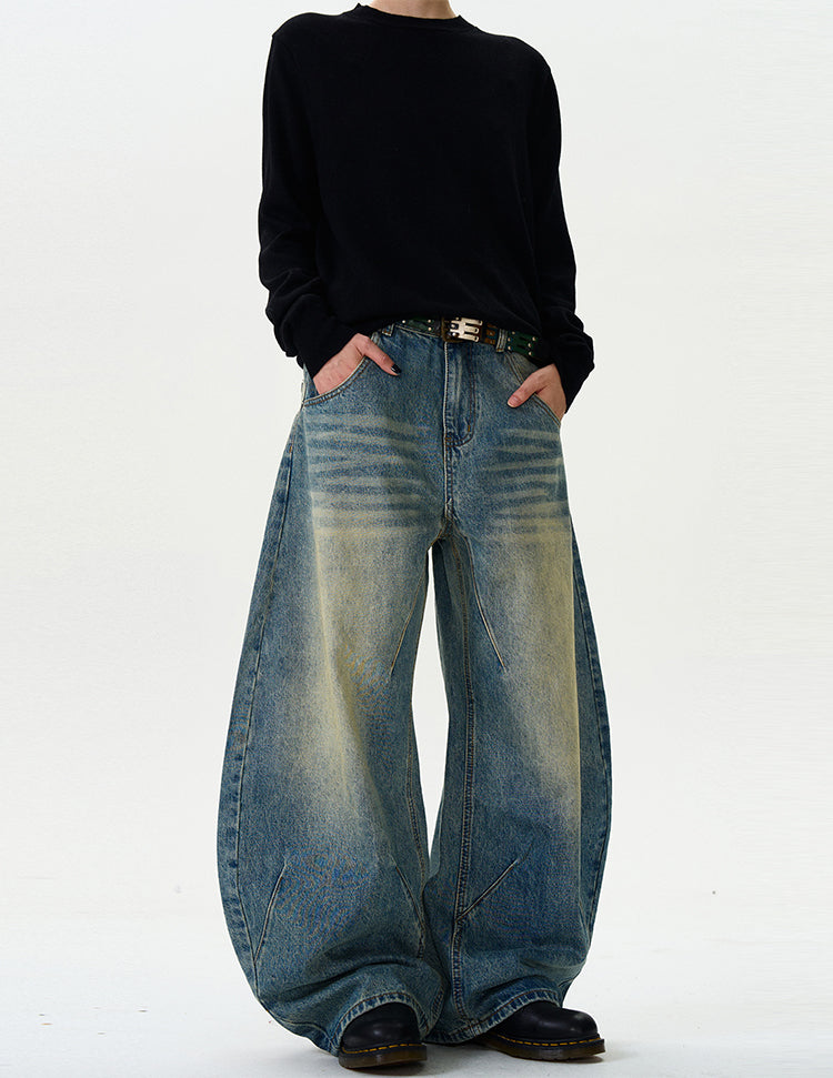 Retro three-dimensional cut-wash scimitar jeans