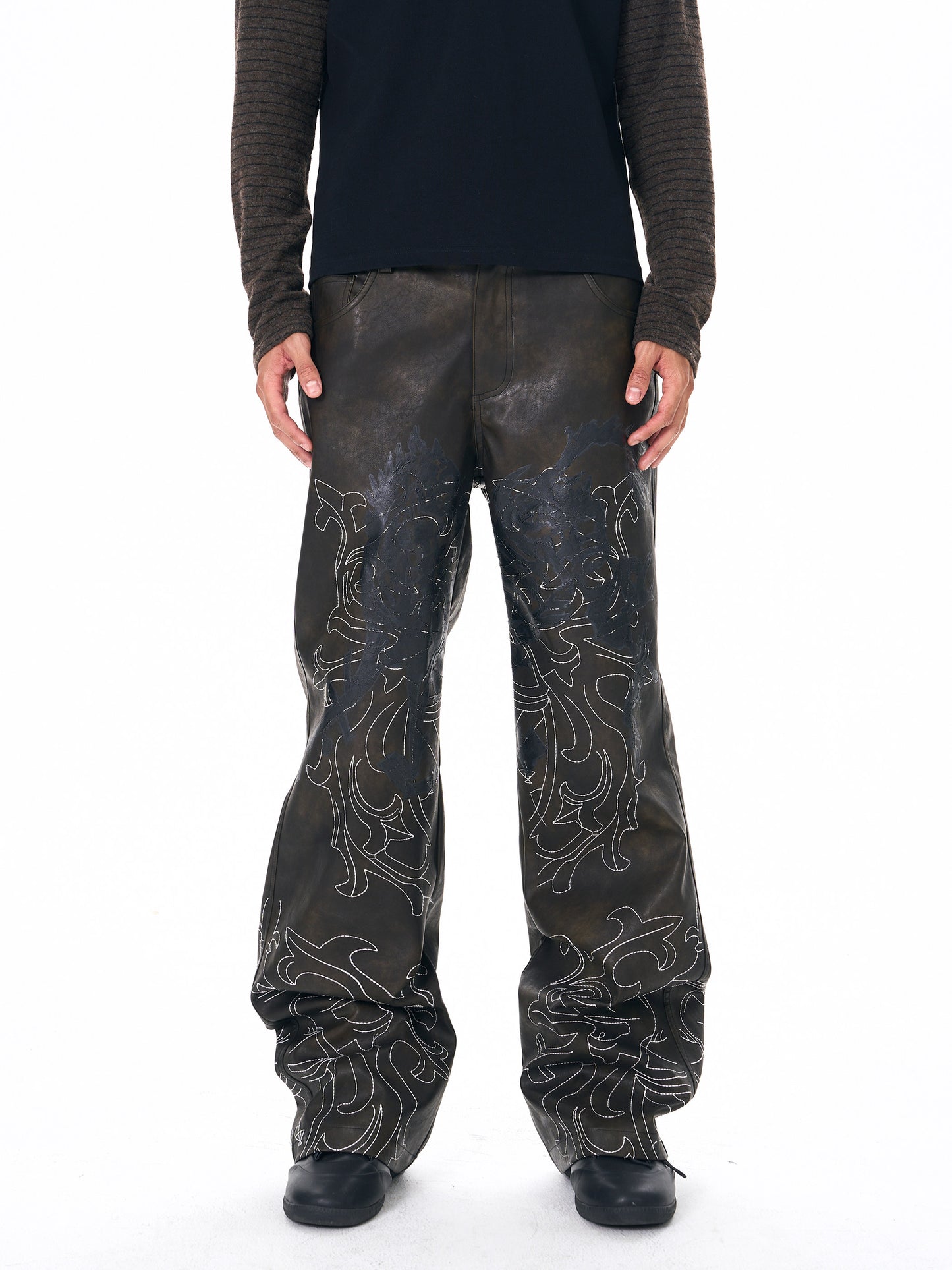 Hand-embroidered leather pants