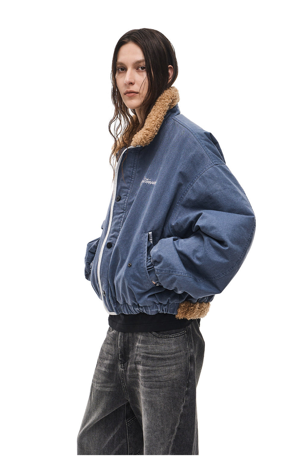 Jacket with a lambswool collar