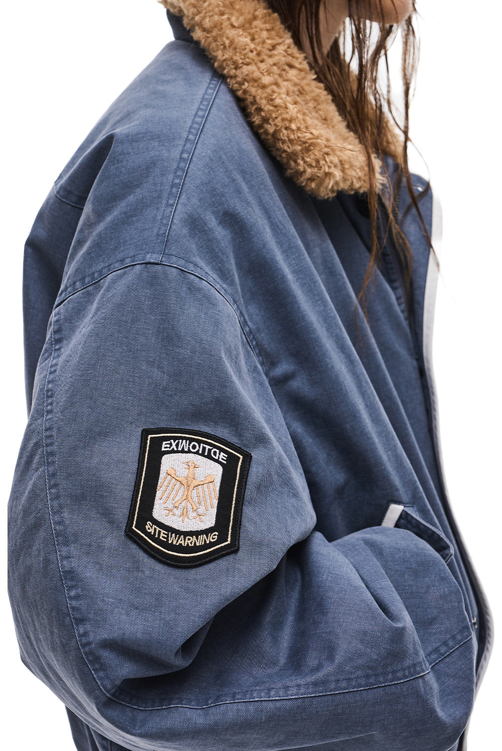 Jacket with a lambswool collar