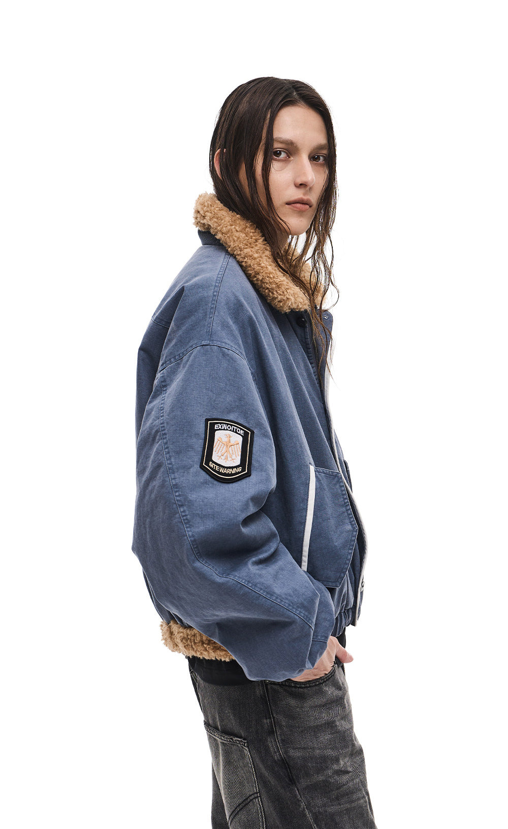 Jacket with a lambswool collar