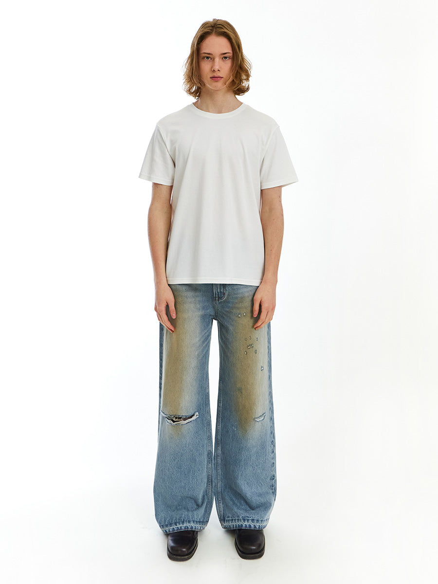 Mud-dyed washed casual jeans