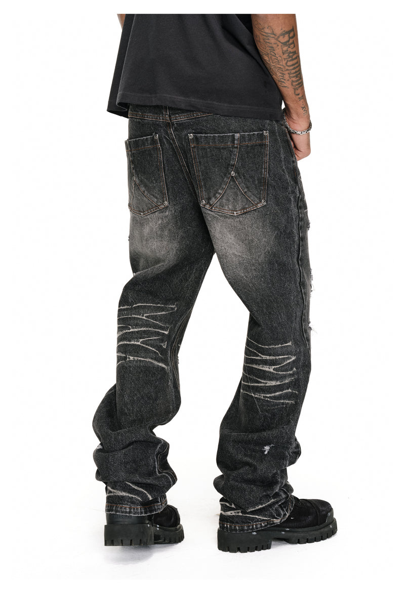 Distressed wash flare jeans