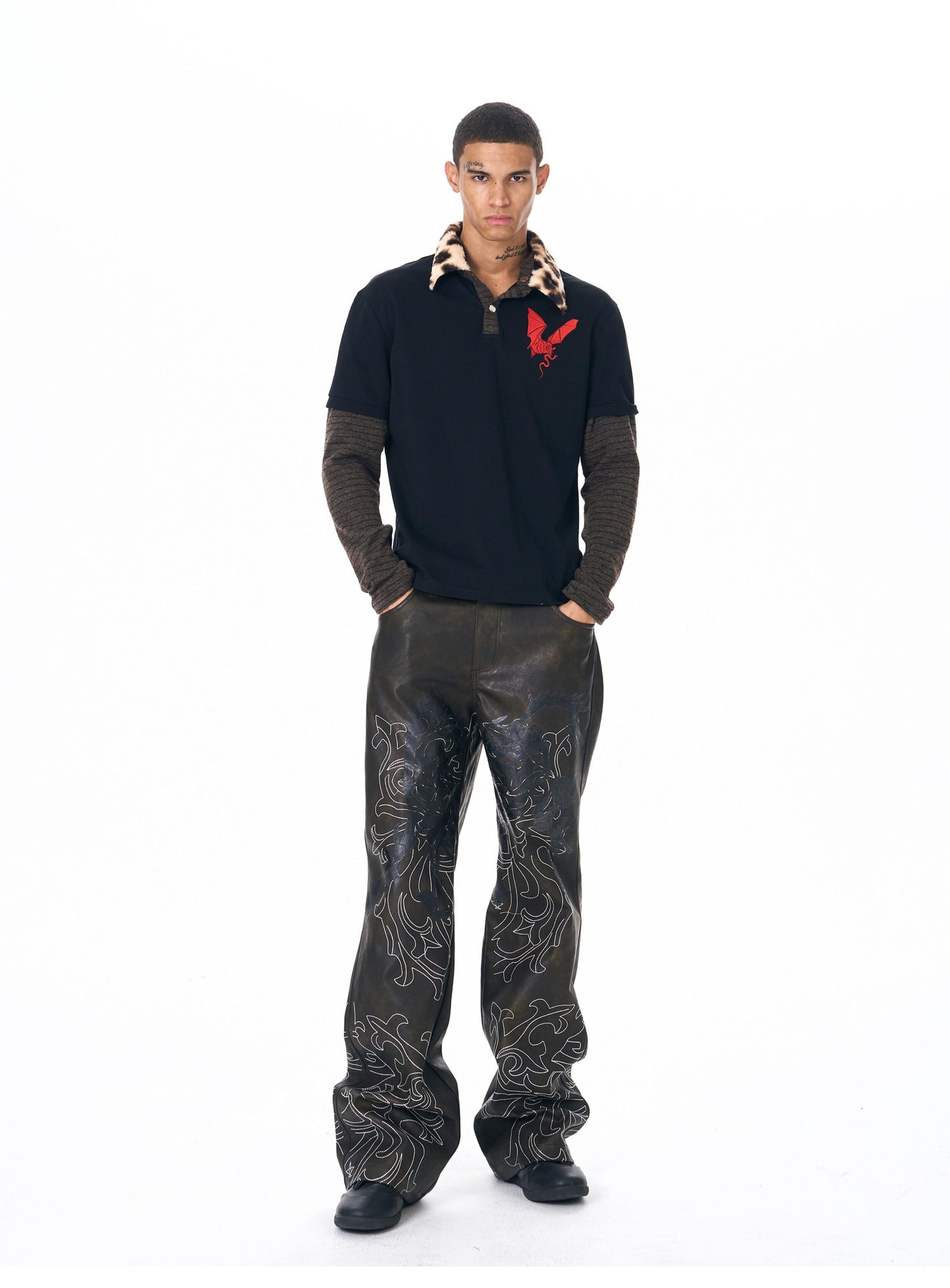 Hand-embroidered leather pants