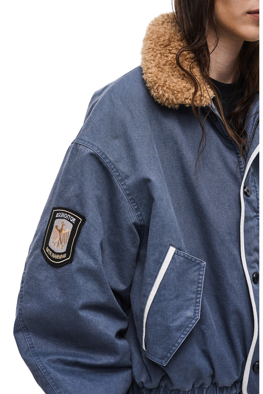 Jacket with a lambswool collar