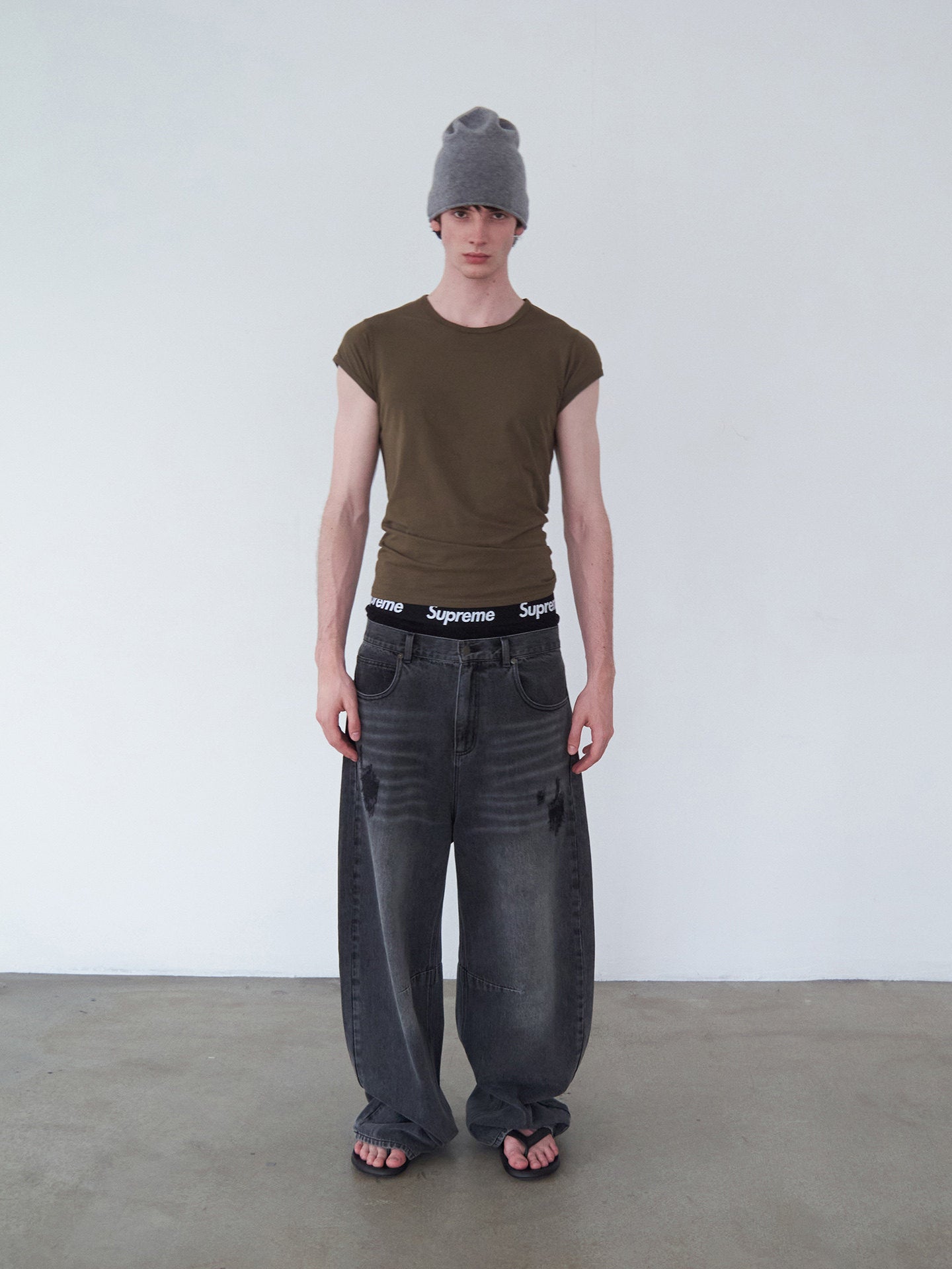 Distressed Patchwork Curved-Cut Denim Pants