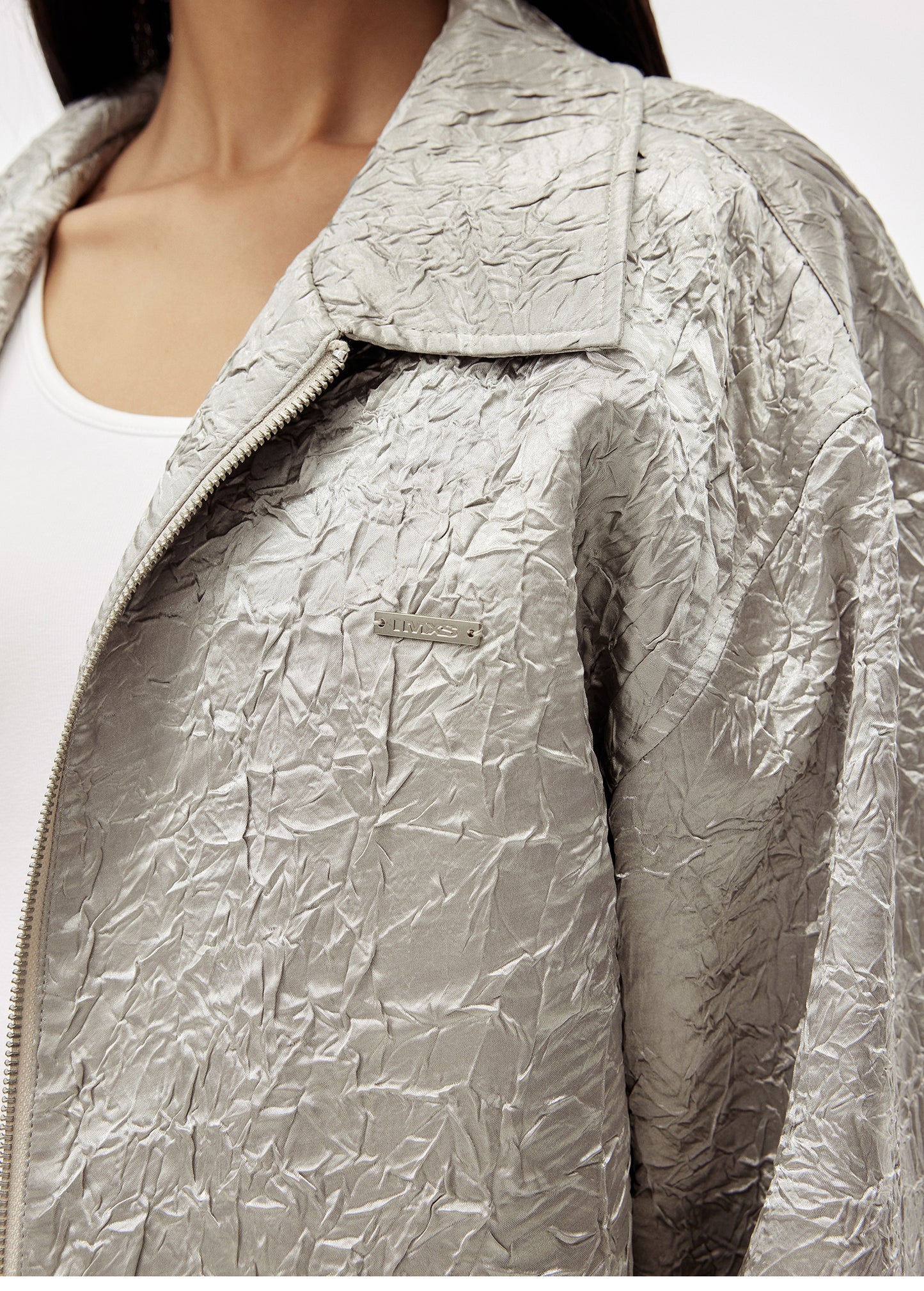 Deconstructed textured pleated jacket