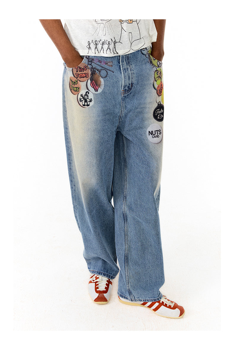 Medal print denim pants