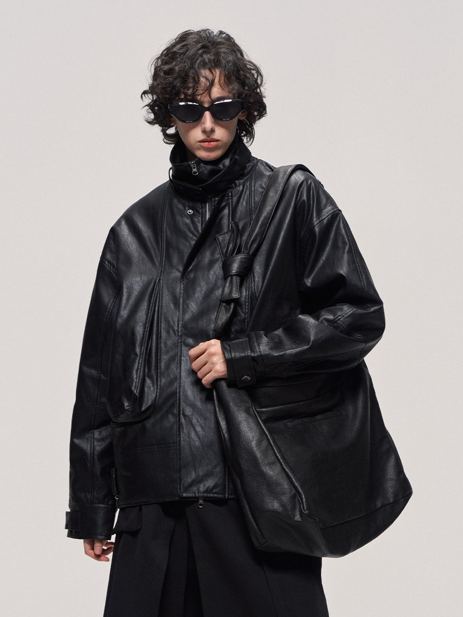 Damaged mid-length leather jacket