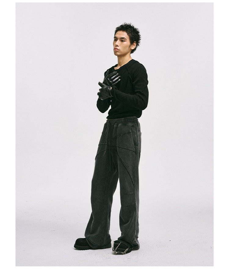 Raw-edge heavy-wash sweatpants