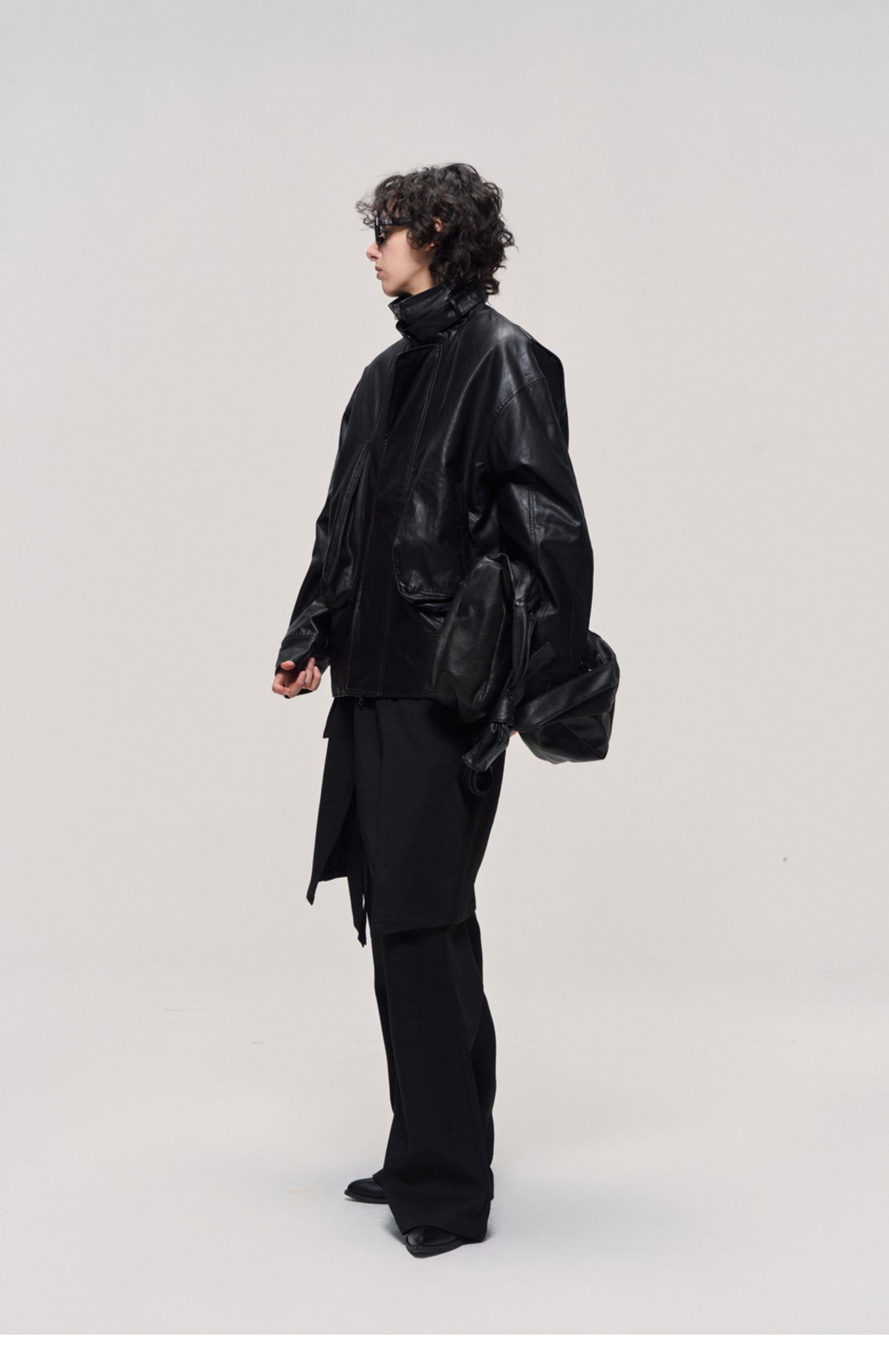 Damaged mid-length leather jacket