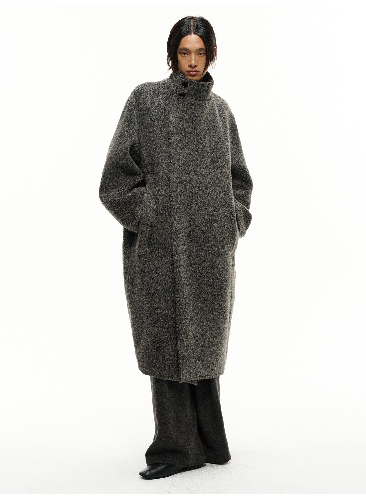 Long coat with a diagonal front panel