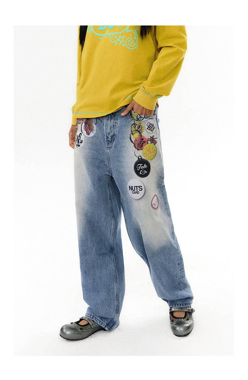 Medal print denim pants