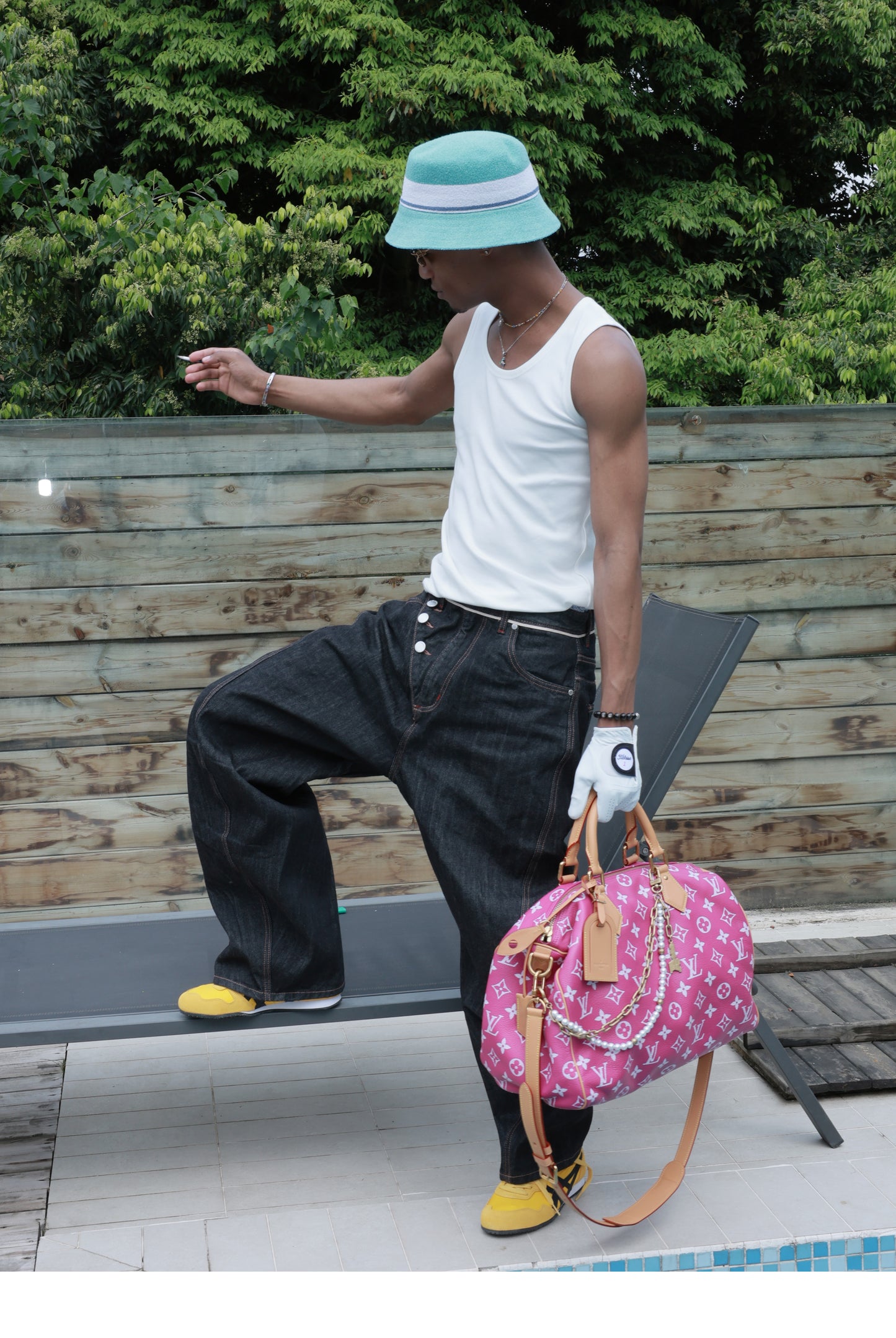 Denim pants with diagonal buckles