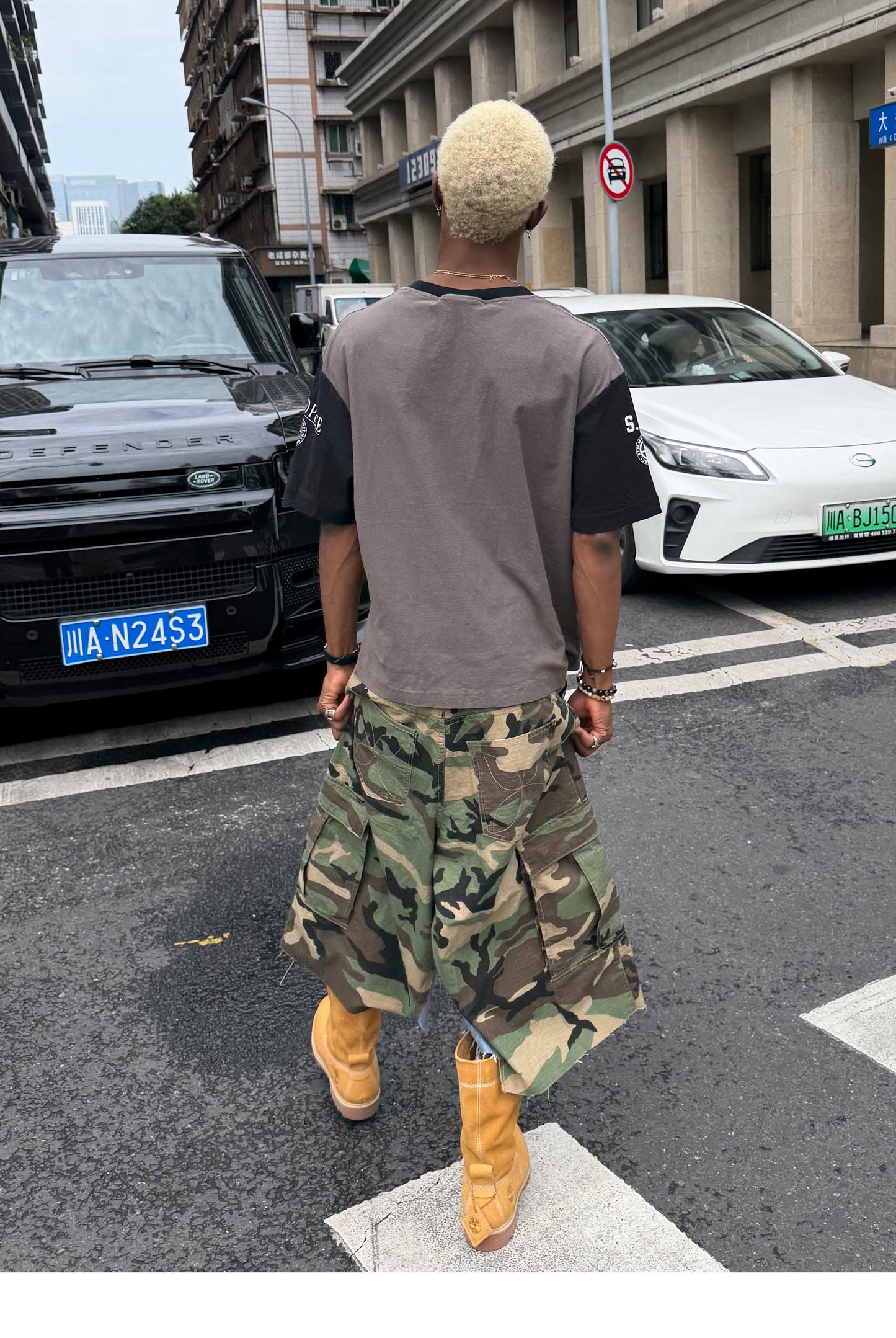 Camouflage-Print Distressed Patchwork Shorts
