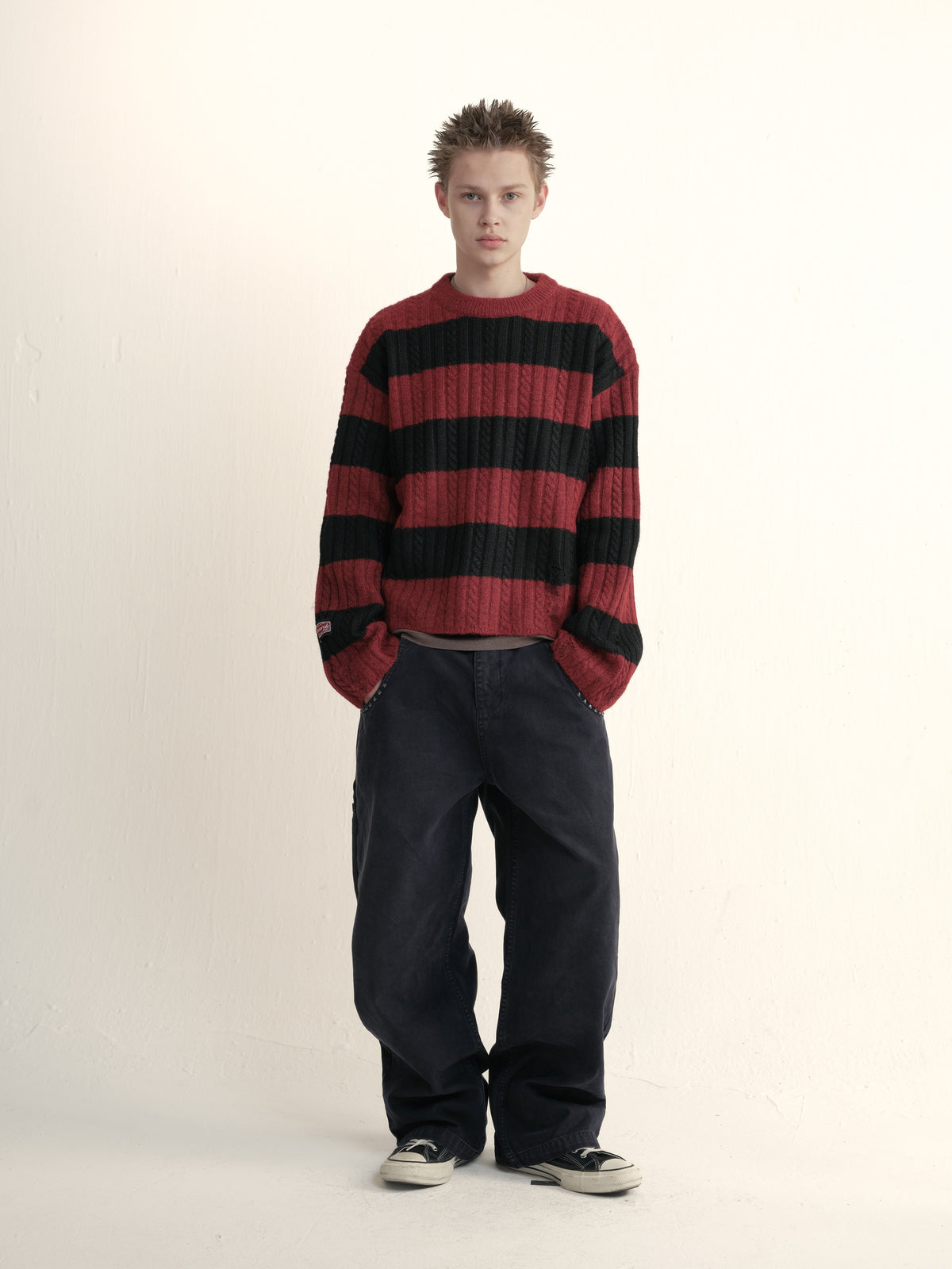 Cable wool striped distressed sweater