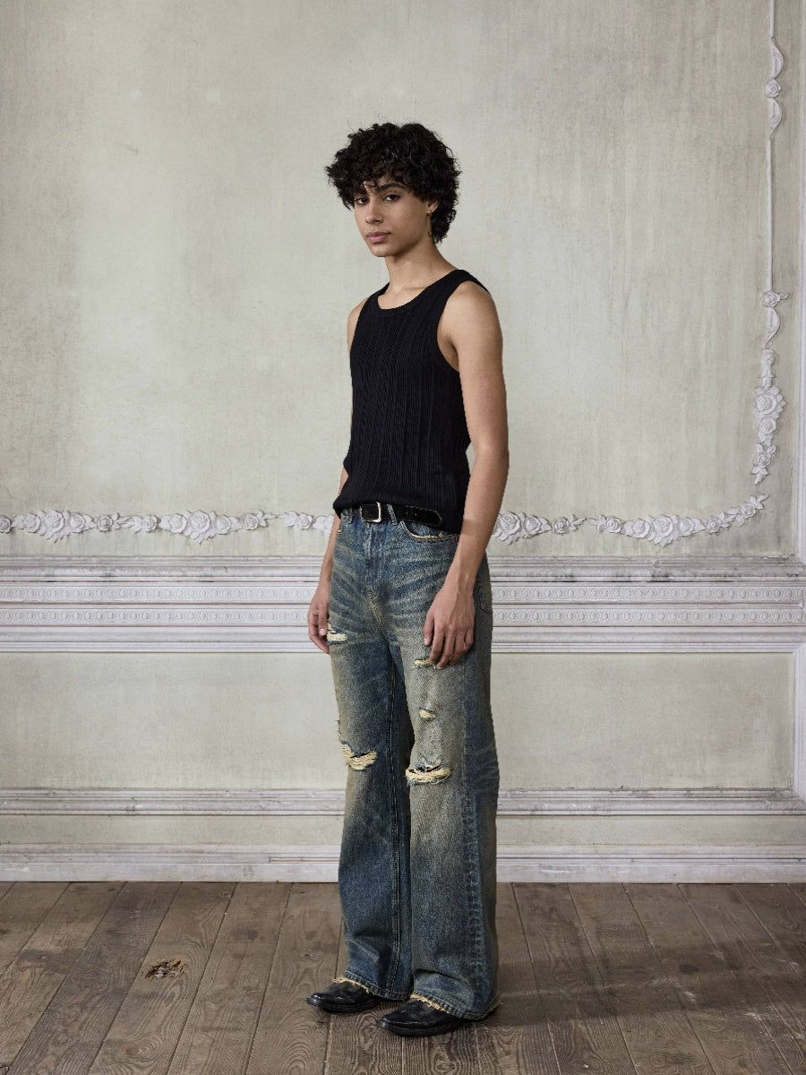 Distressed wash bootcut jeans