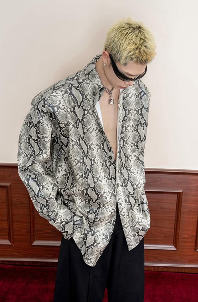 Snakeskin patterned shirt with shoulder pads