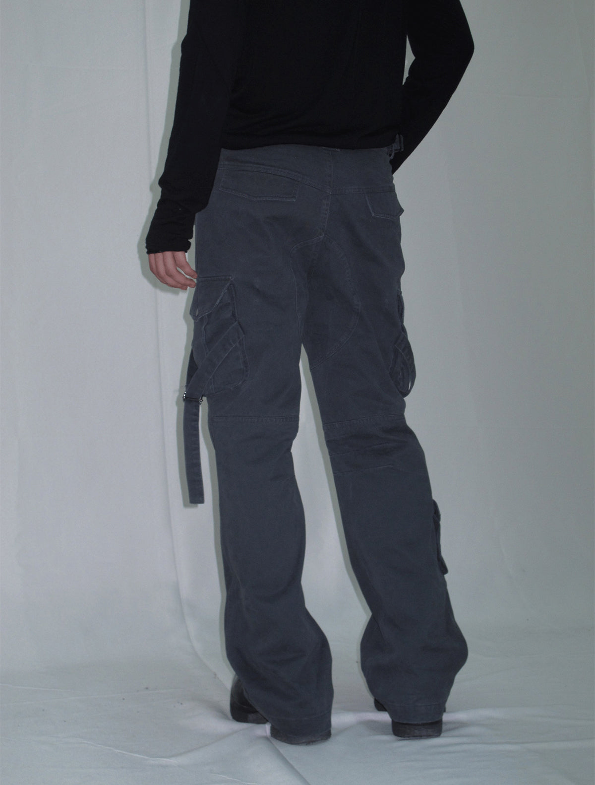 Cargo pants with multi-pocket straps